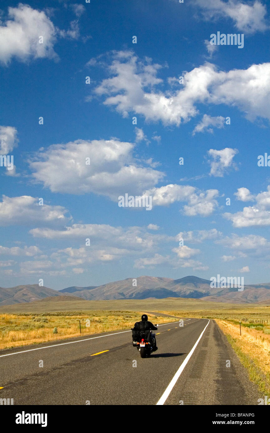 Motorcycling along US Highway 20 near Arco, Idaho, USA. Stock Photo