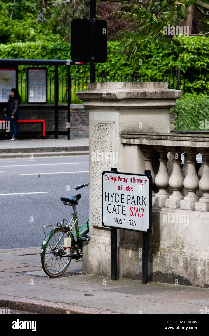 Hyde Park Gate road sign with bike Stock Photo Alamy