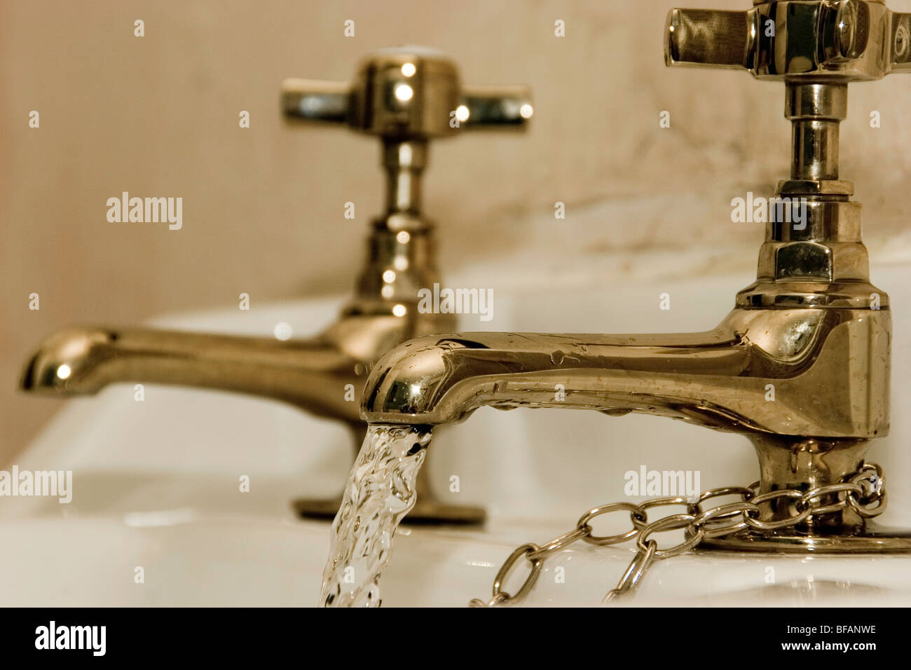running water from taps Stock Photo Alamy