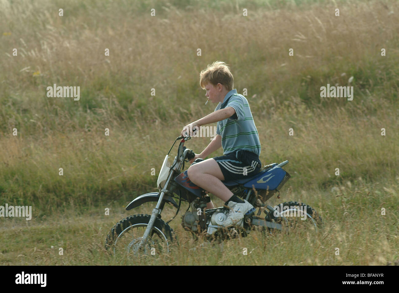 Teenager on motorbike hi res stock photography and images Alamy