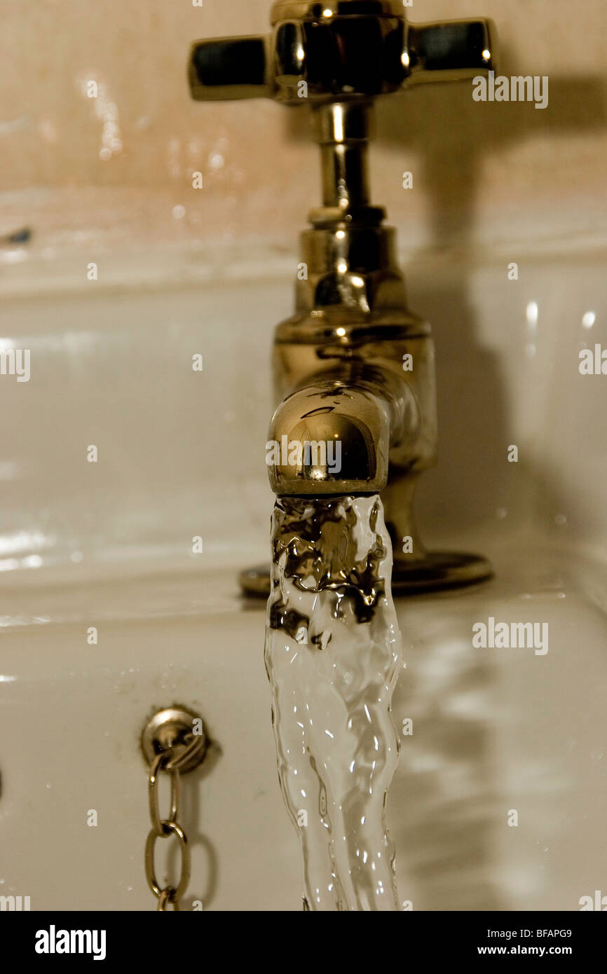 water running from tap Stock Photo Alamy