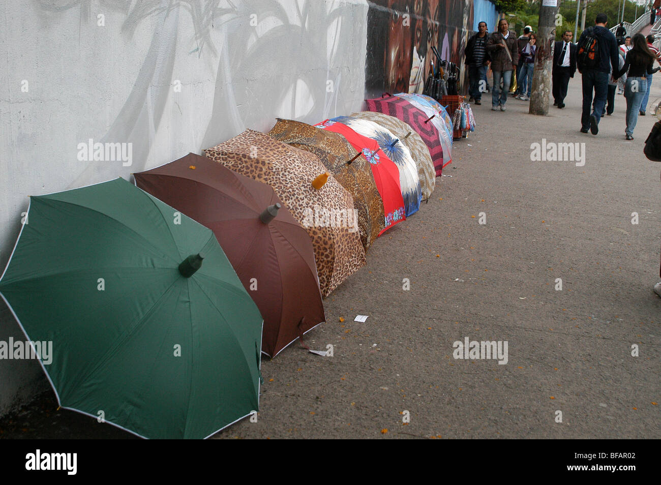 Umbrellas to sell near train station in São Paulo, Brazil. 23/10/2009 at 06:08am on friday. Stock Photo