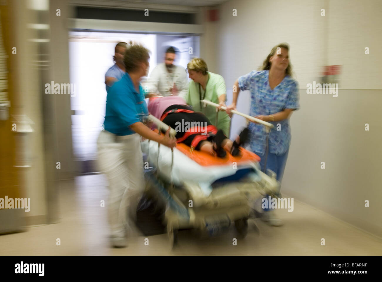 Emergency room, EMTs rush patient to operating room Stock Photo - Alamy