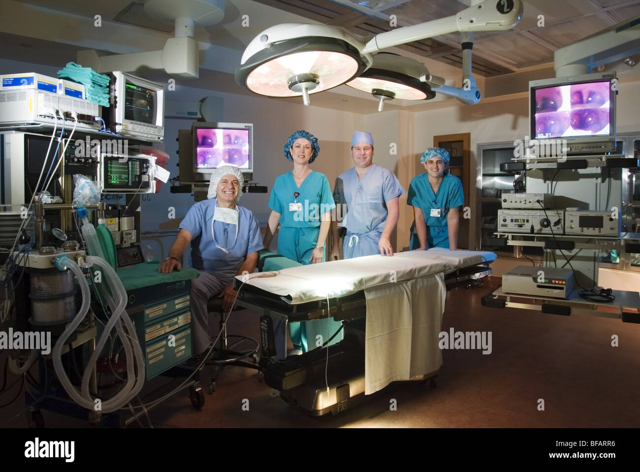 Operation Theater, surgeons and nurses in operating room Stock Photo