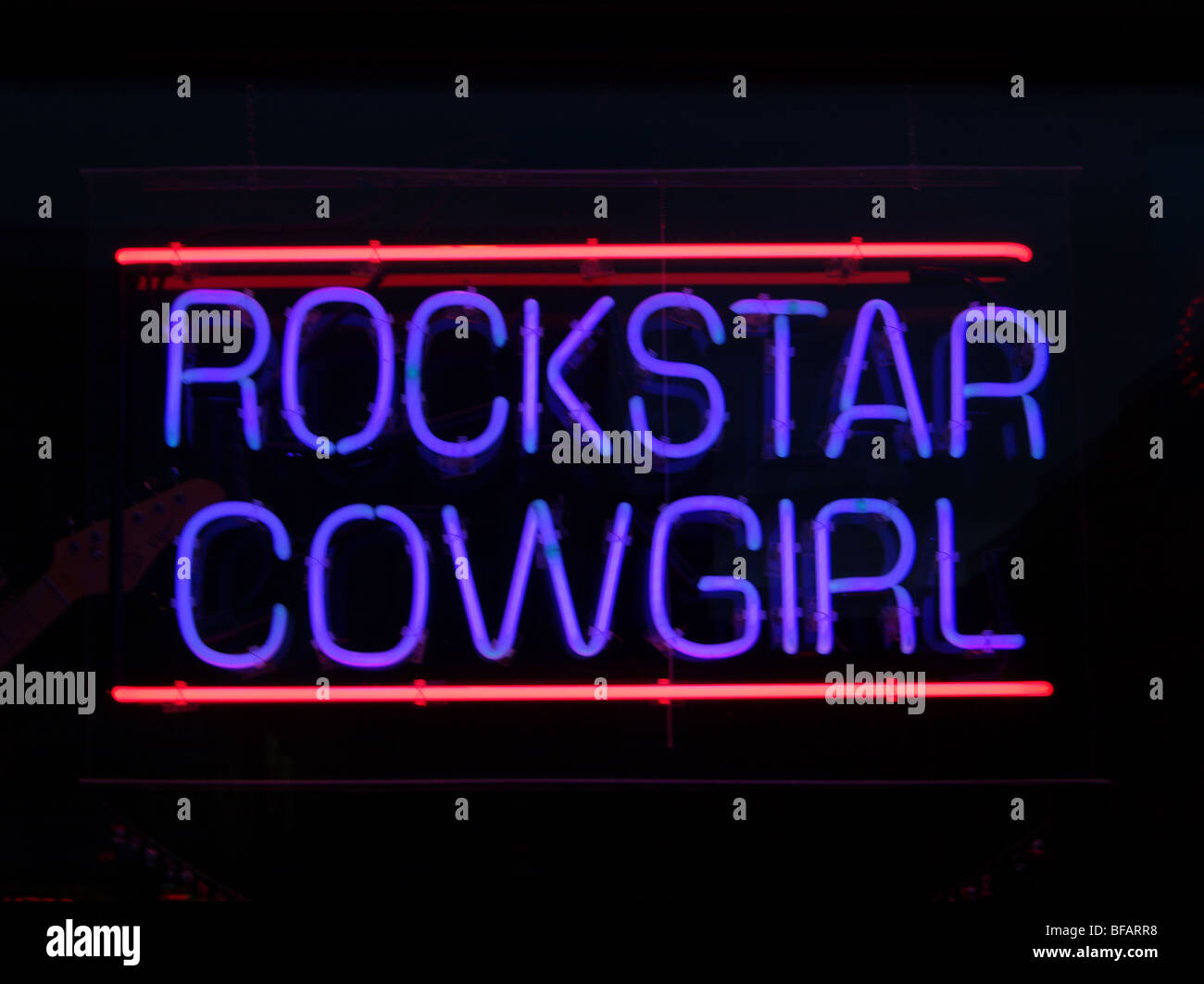 Neon sign Rockstar Cowgirl Cody Wyoming. Stock Photo