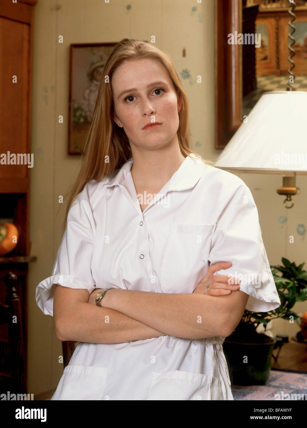 stressed nurse looking upset working under pressure Stock Photo Alamy