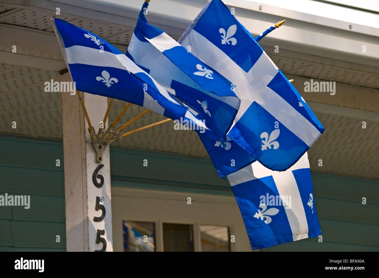 Quebec's flags on a house St Jean sur Richelieu Stock Photo