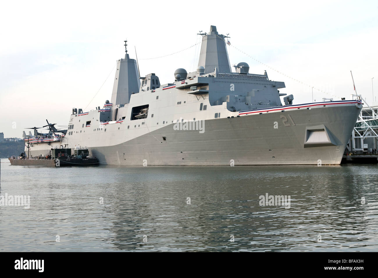 view of USS New York after commissioning moored at Pier 88 on Hells Kitchen New York City waterfront Stock Photo