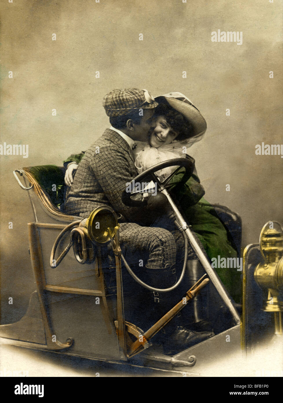 Couple Making Out in Old Roadster Auto Stock Photo