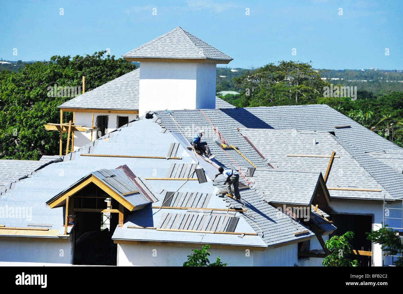 Men Working on Roof in Nassau Bahamas Stock Photo Alamy