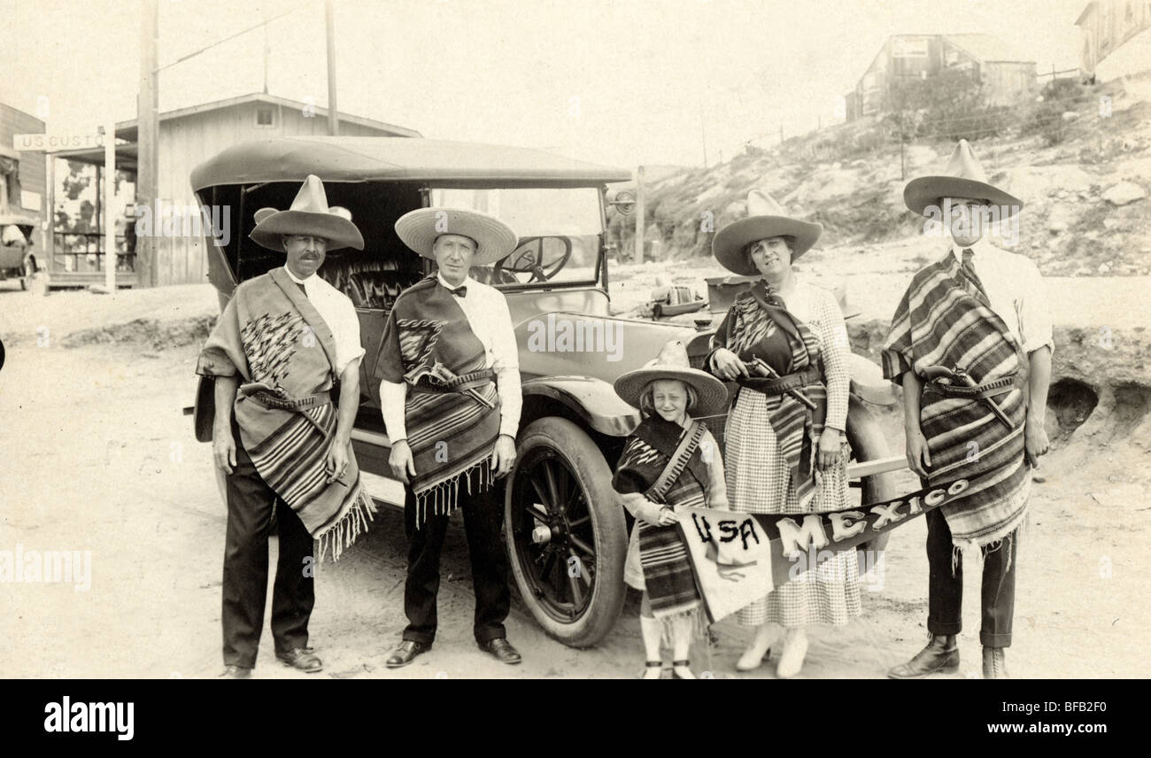 Family with Auto at USA & Mexico Border Stock Photo