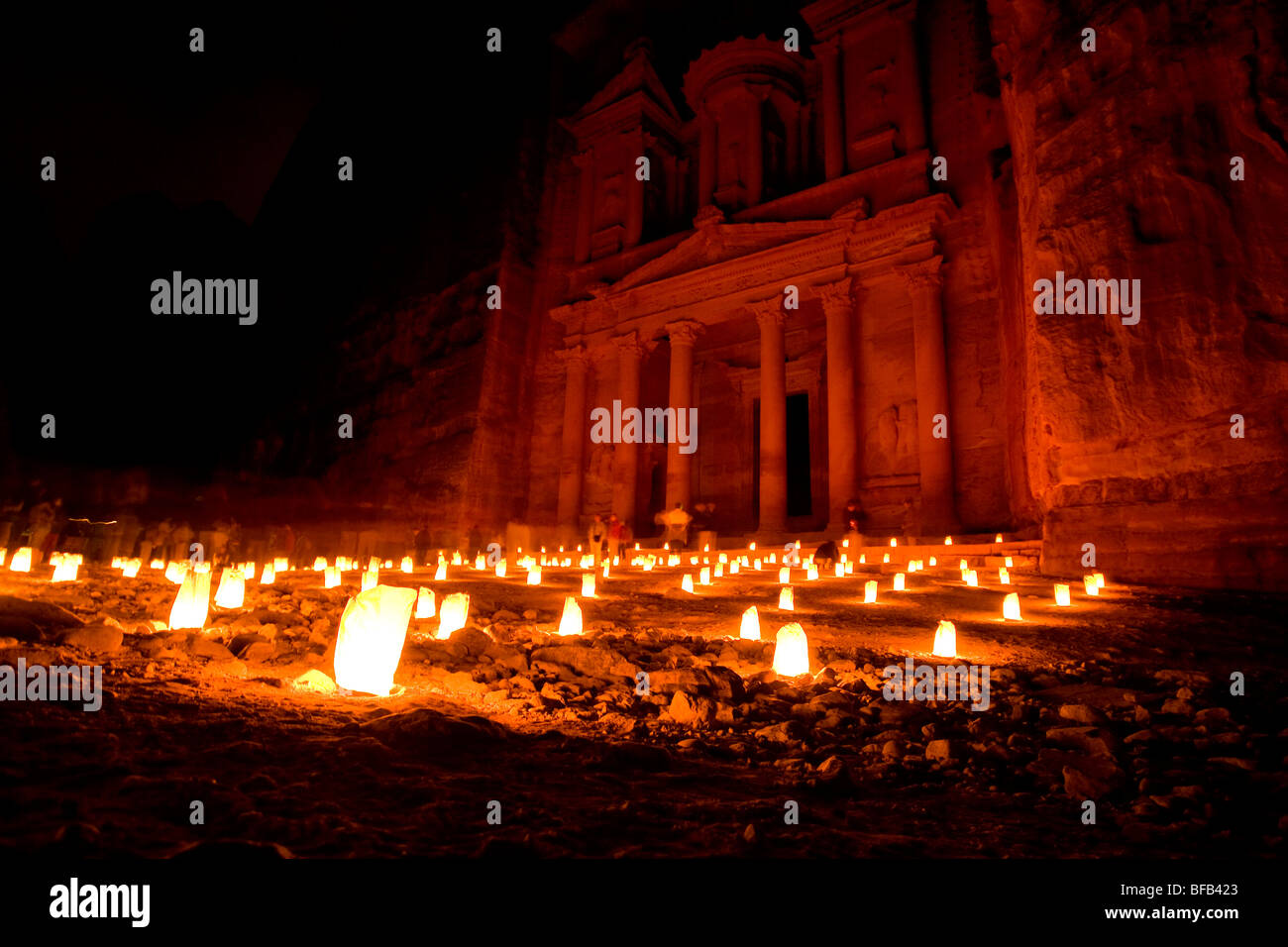 The famous Treasury lit up by candles at Petra by night, Jordan Stock Photo