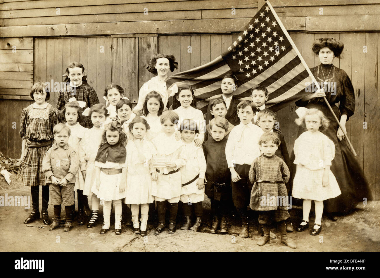 Grade School Class & Patriotic Teacher Stock Photo