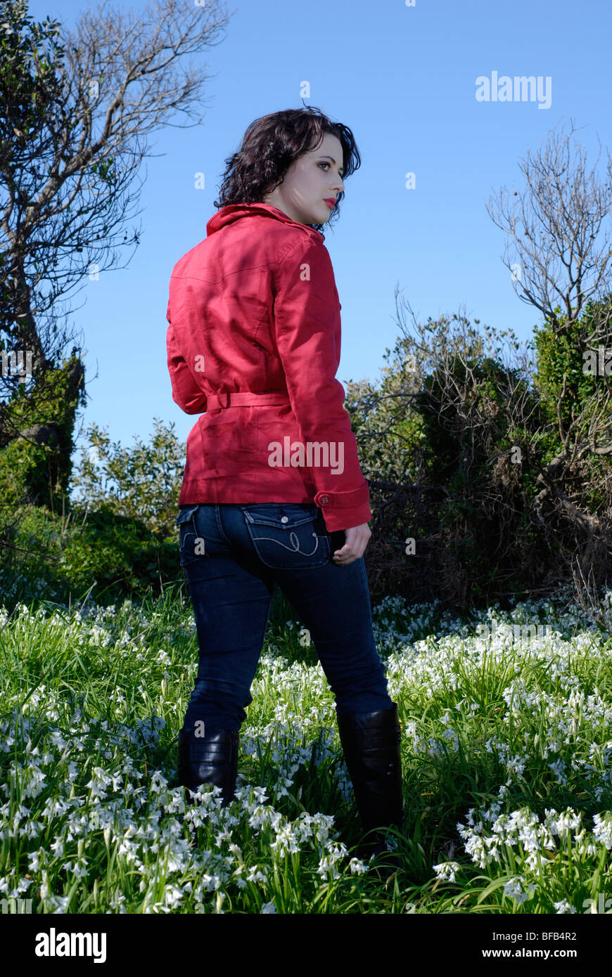 Person wearing red jacket hi-res stock photography and images - Alamy