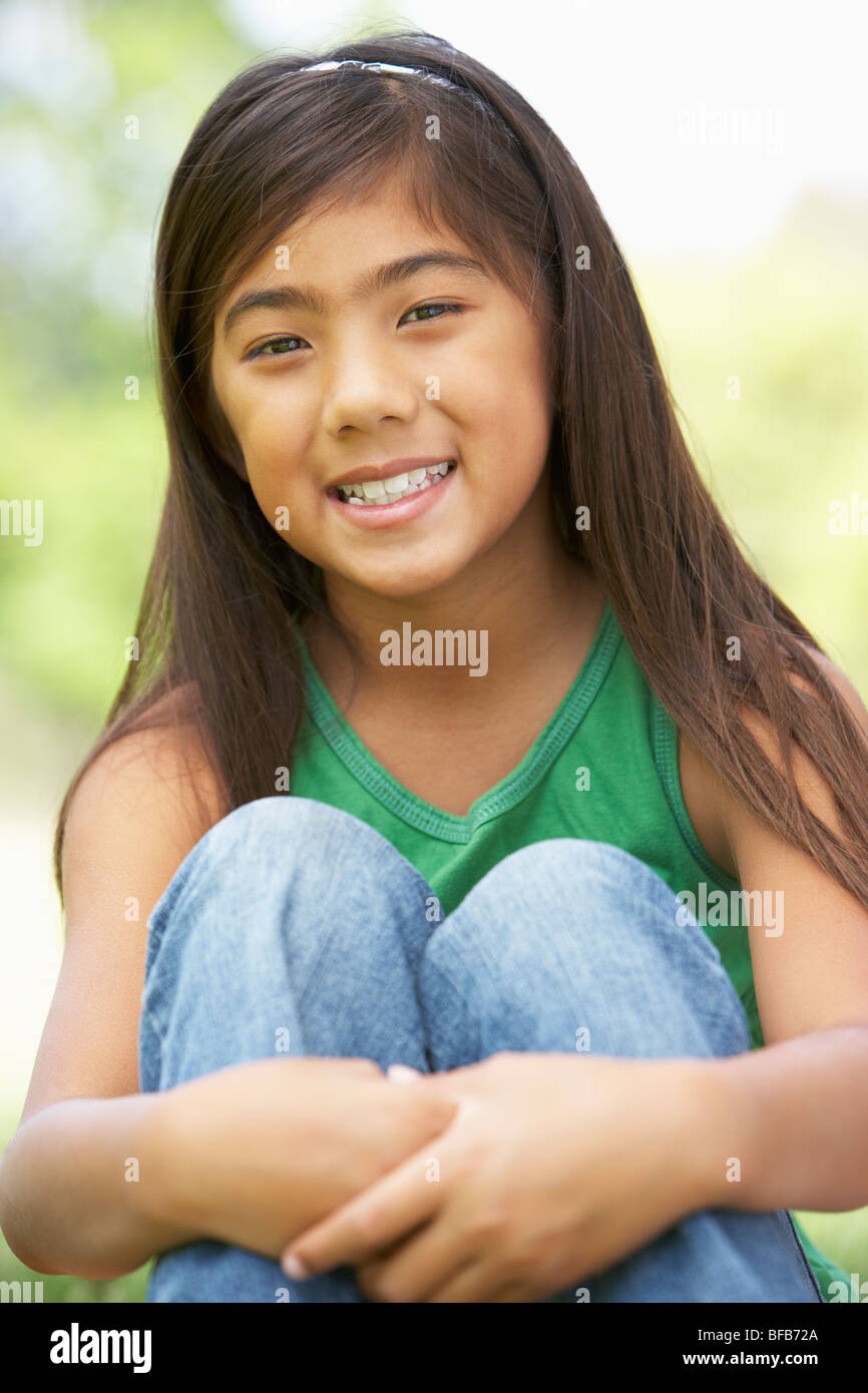 Portrait Of Young Girl In Park Stock Photo - Alamy