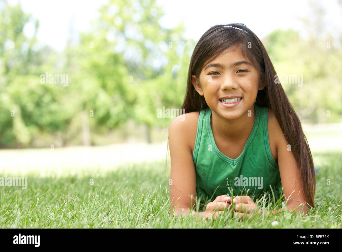 Nine year old girl in park hi-res stock photography and images - Alamy