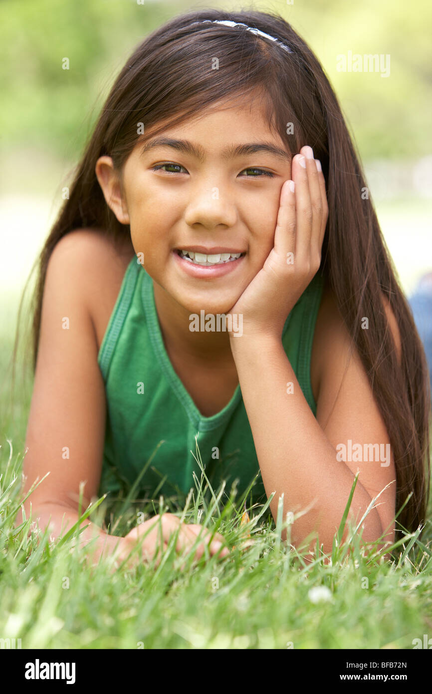 Portrait Of Young Girl In Park Stock Photo - Alamy