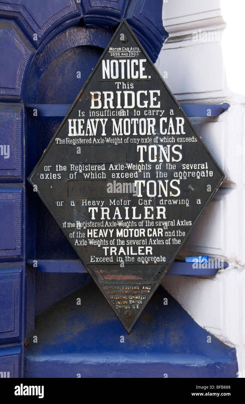 An old weight restriction sign on Blackheath railway bridge, South London Stock Photo