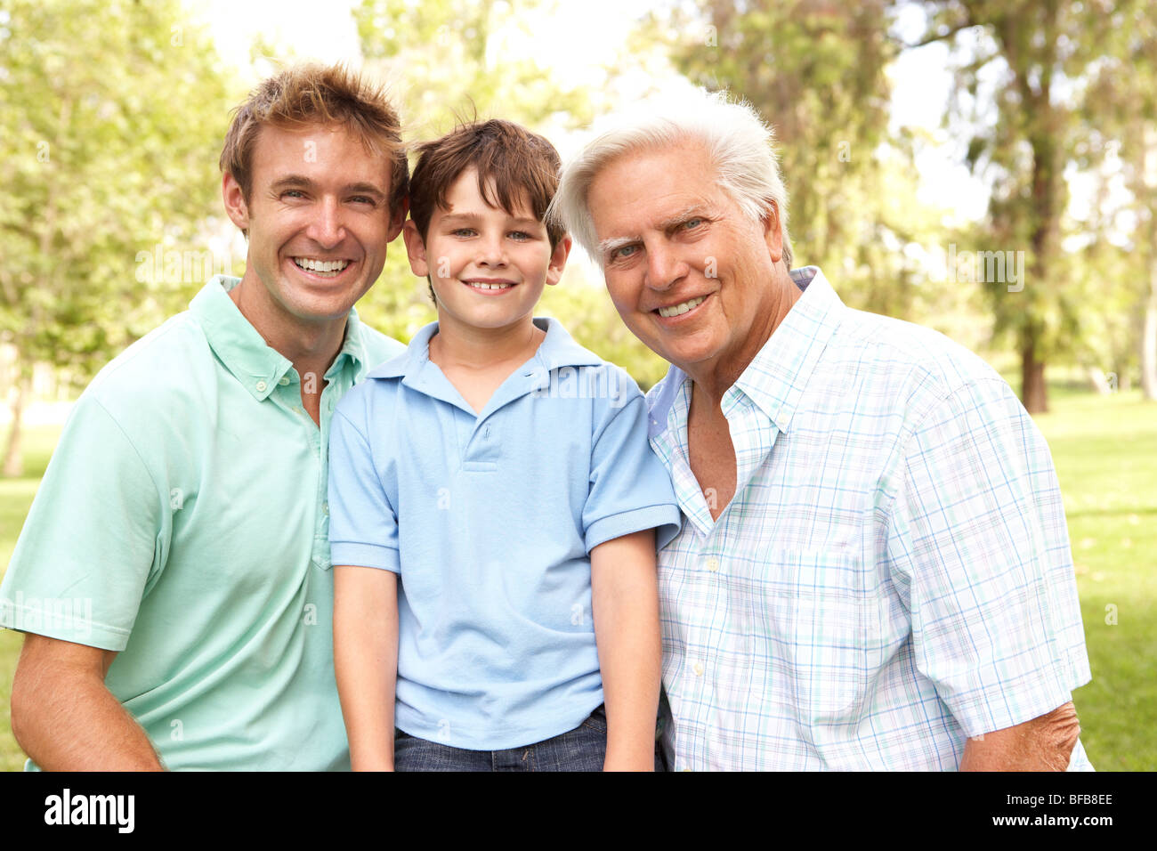 Grandfather With Father And Son In Park Stock Photo - Alamy