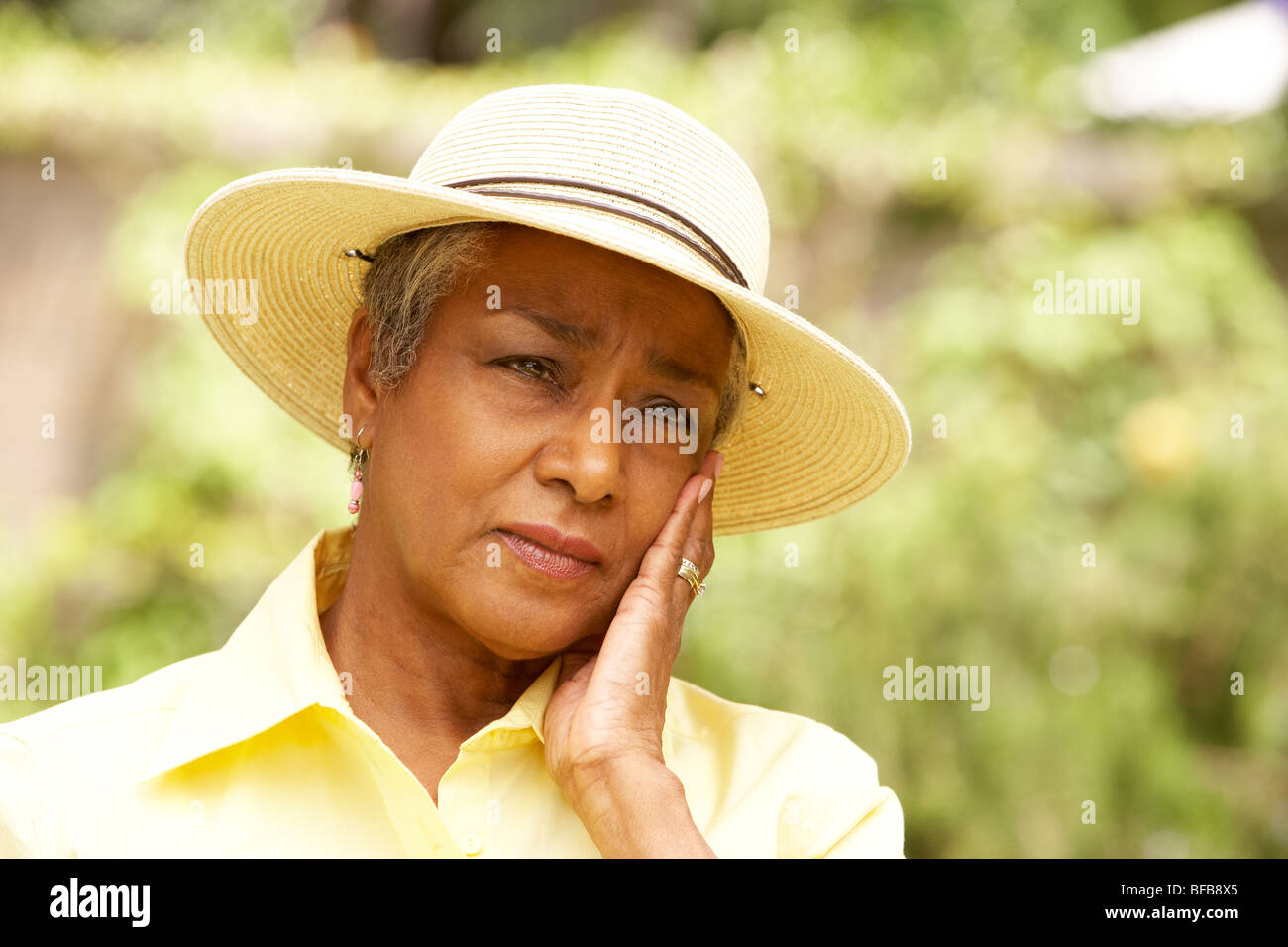 Senior Woman With Thoughtful Expression Stock Photo