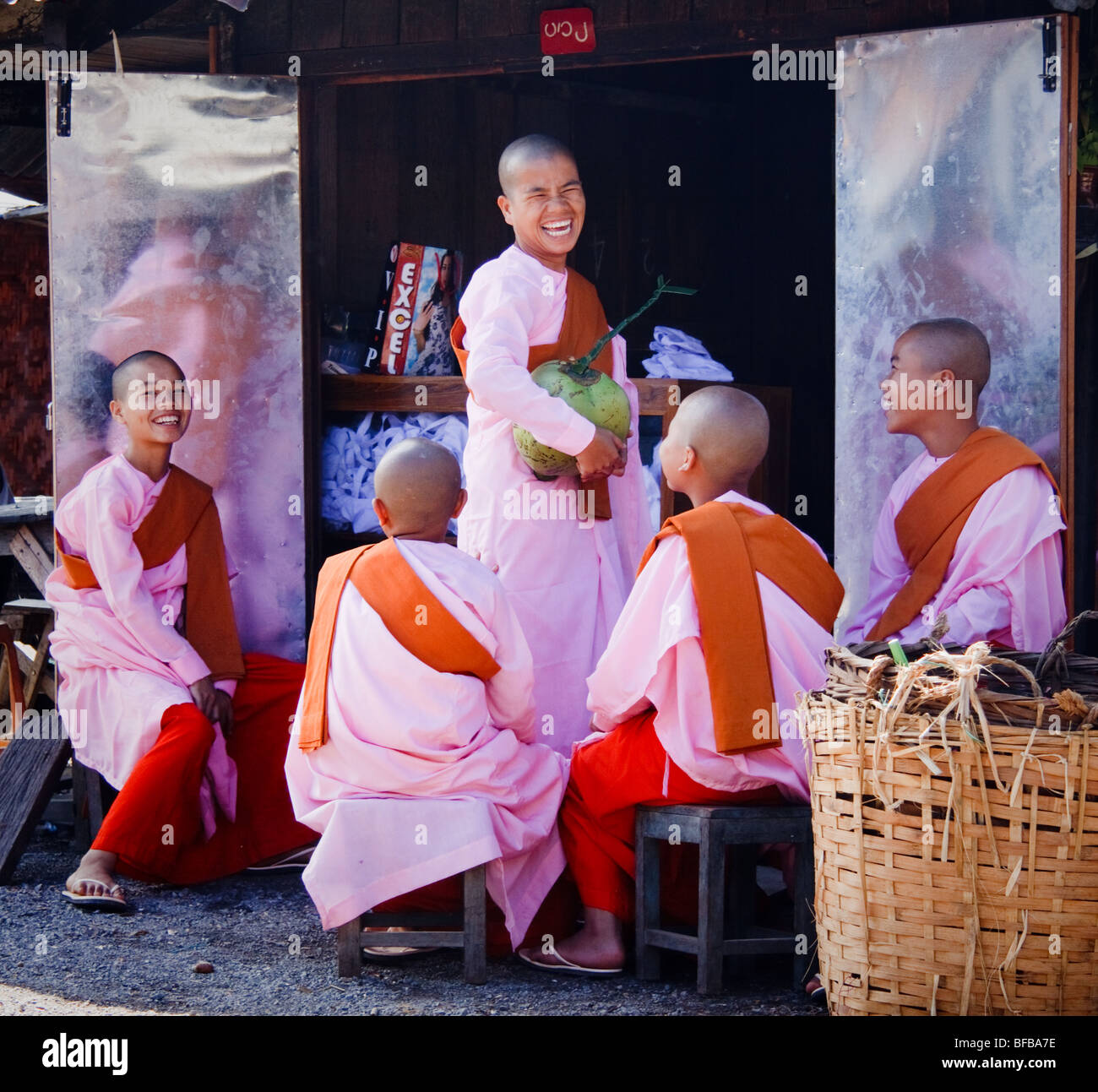 five happy  nuns on a market in Nyaungshwe, Shan State Stock Photo