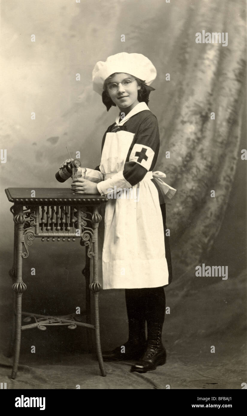 Little Girl Nurse Pouring Medication Stock Photo