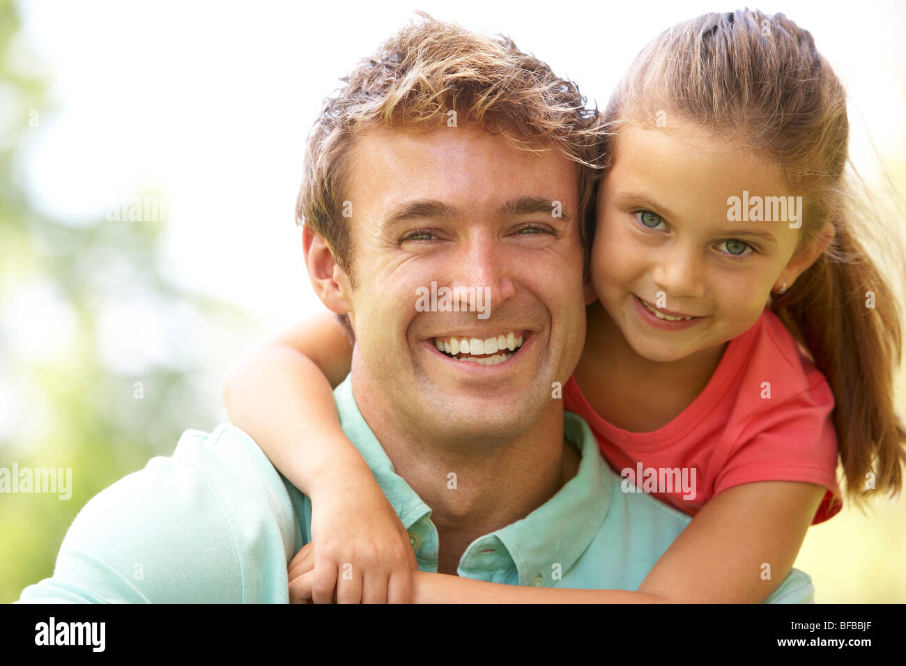 Portrait Of Father And Daughter In Park Stock Photo - Alamy