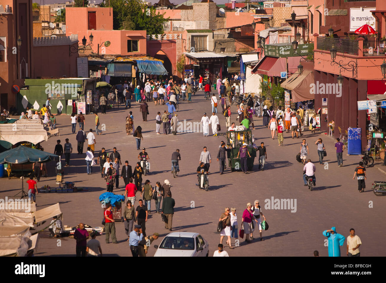 MARRAKESH, MOROCCO - People at the Djemaa el-Fna main square in the medina. Stock Photo