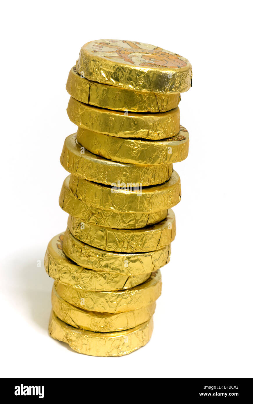 Chocolate gold foil wrapped coins. (© Richard B. Levine) Stock Photo