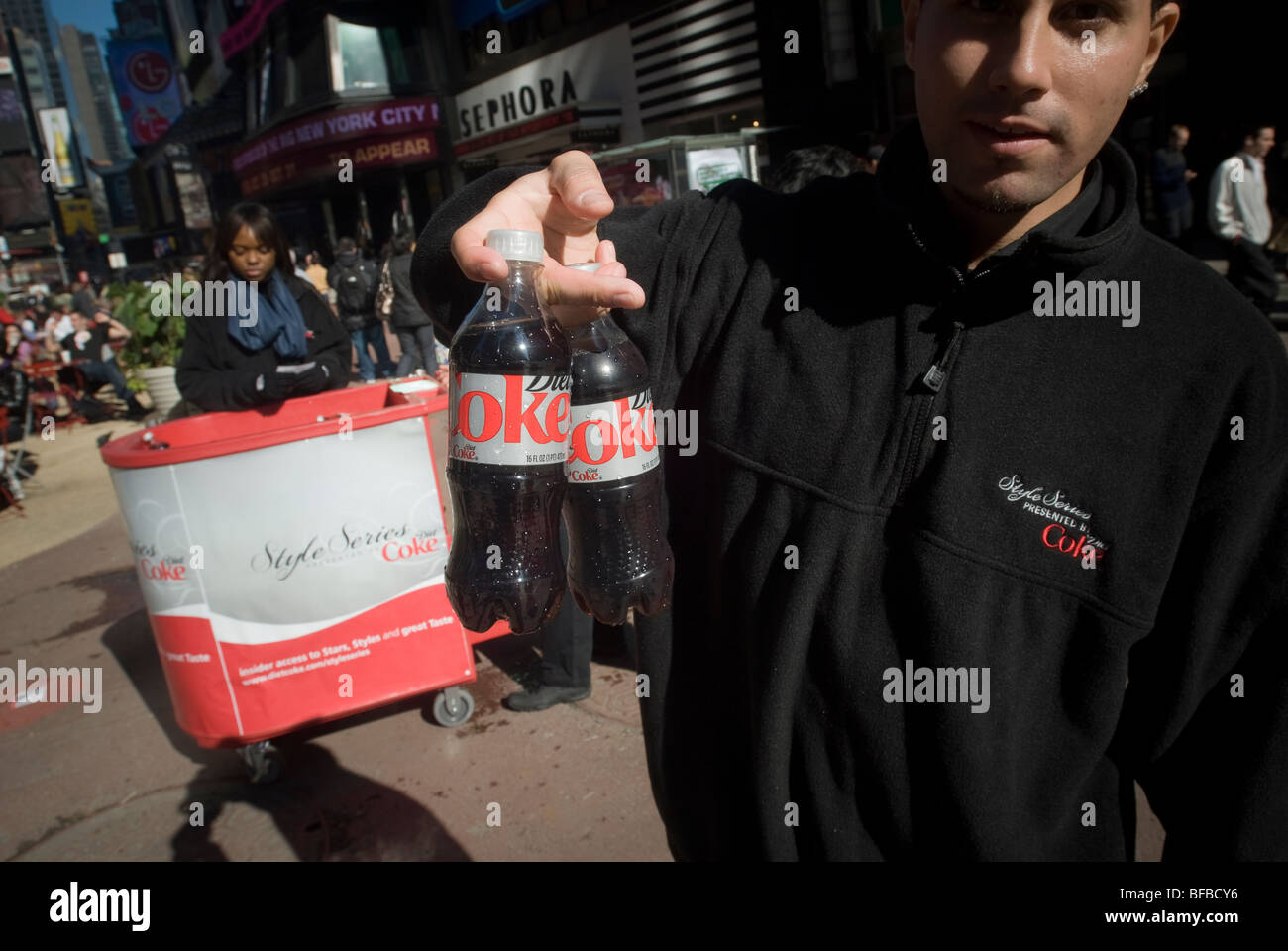 Coca-Cola hands out free bottles of Diet Coke during a promotional event in Times Square in New York Stock Photo