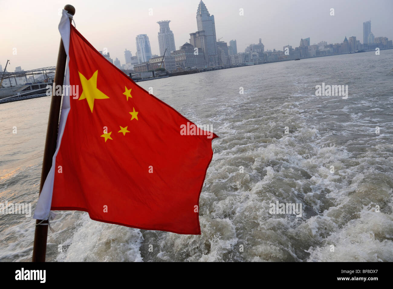 Chinese national flag and Shanghai Puxi.  29-Oct-2009 Stock Photo