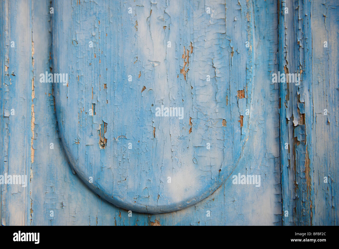 Close up of peeling paint on wood, rustic lifting paint Stock Photo