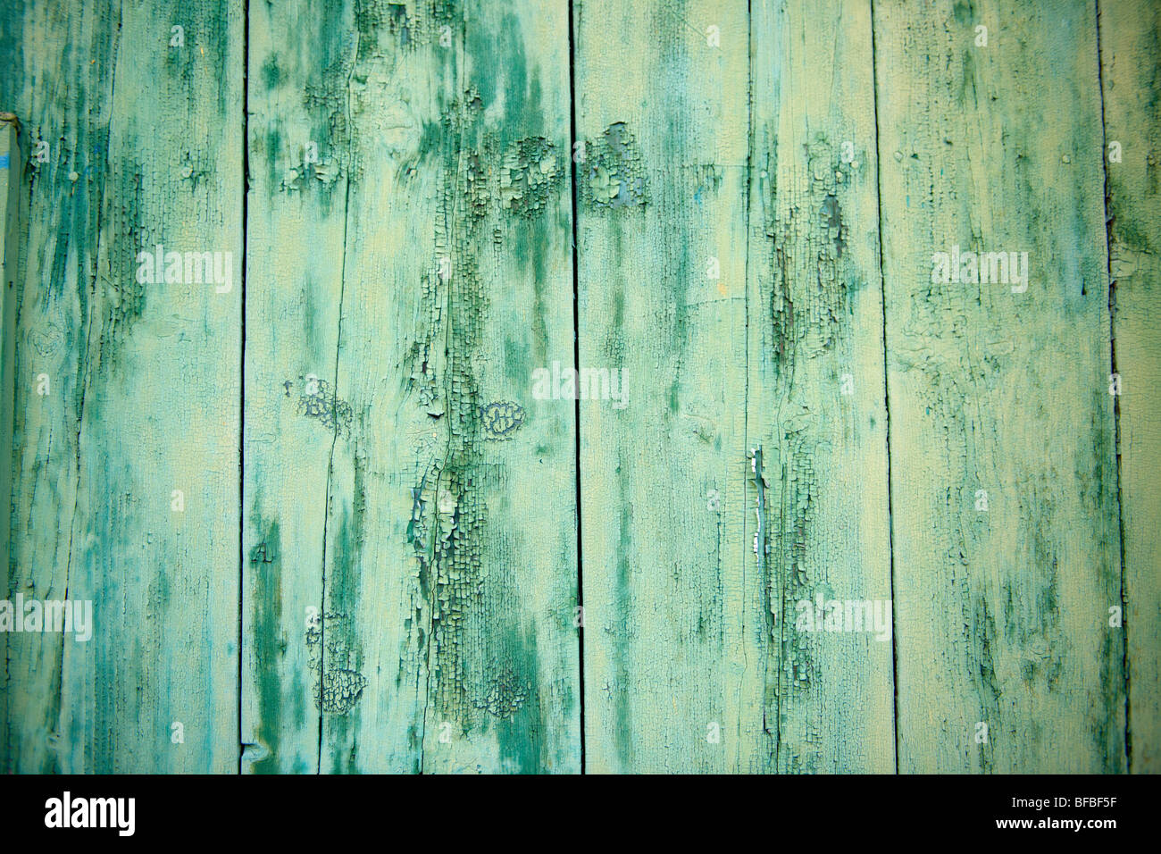 Close up of peeling paint on wood, rustic lifting paint Stock Photo