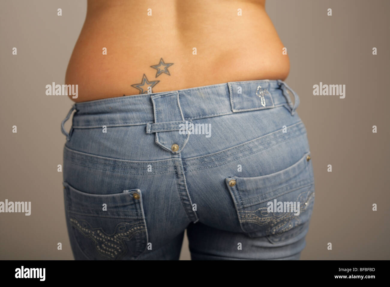 view of a womans bottom in jeans with  no top Stock Photo