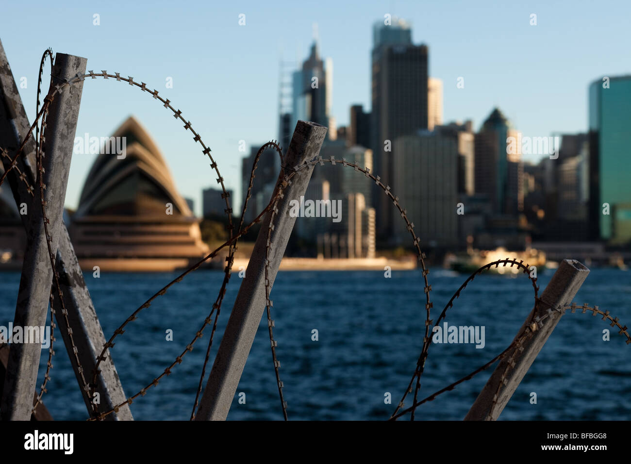 Sydney Opera House framed by barbed wire on the North Shore Stock Photo