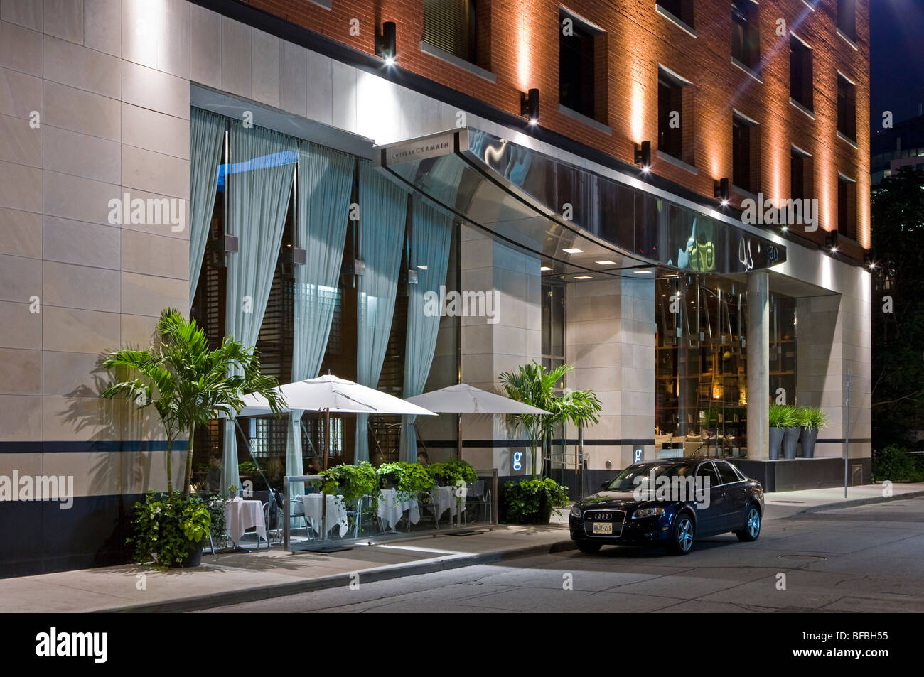 Audi parked by the hotel entrance. Luxury boutique Hotel Le Germain, downtown Toronto, Canada. Stock Photo