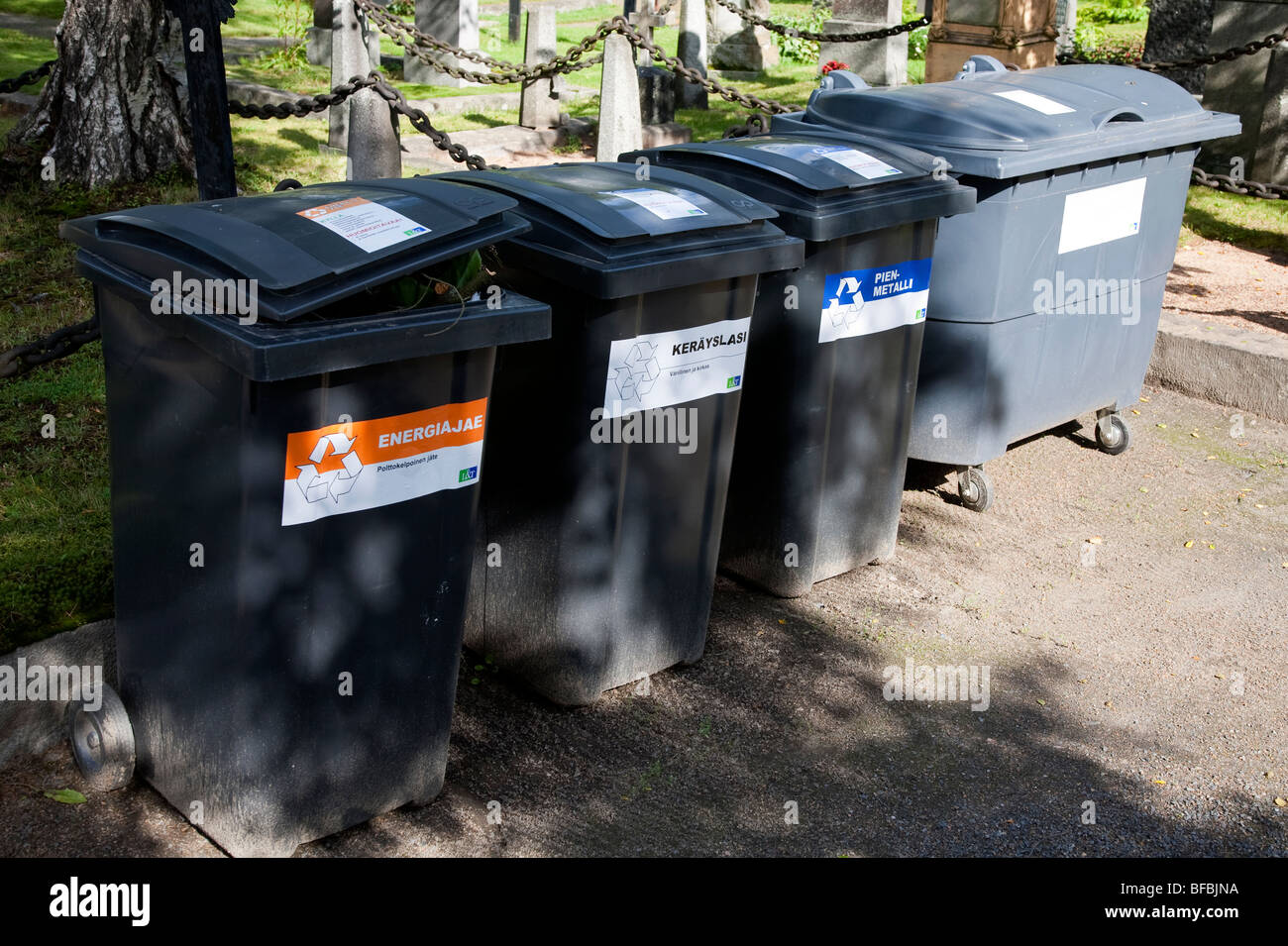 Garbage collecting point outside multiple bins for different recyclable