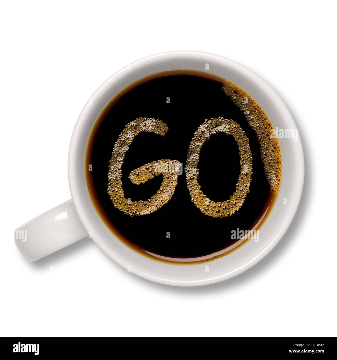 Top view of an isolated cup of coffee with a coffee bubble 'GO' sign inside. Stock Photo