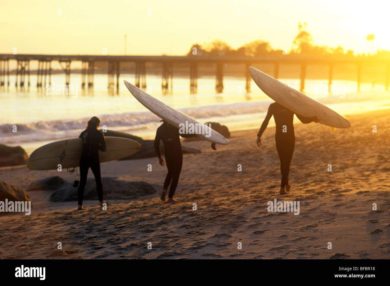 Surfers with boards on Malibu Beach Stock Photo