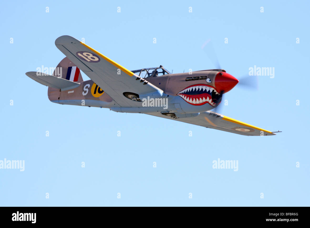 P-40E Warhawk 'Sneak Attack' in flight during the 2009 National Championship Air Races Stock Photo