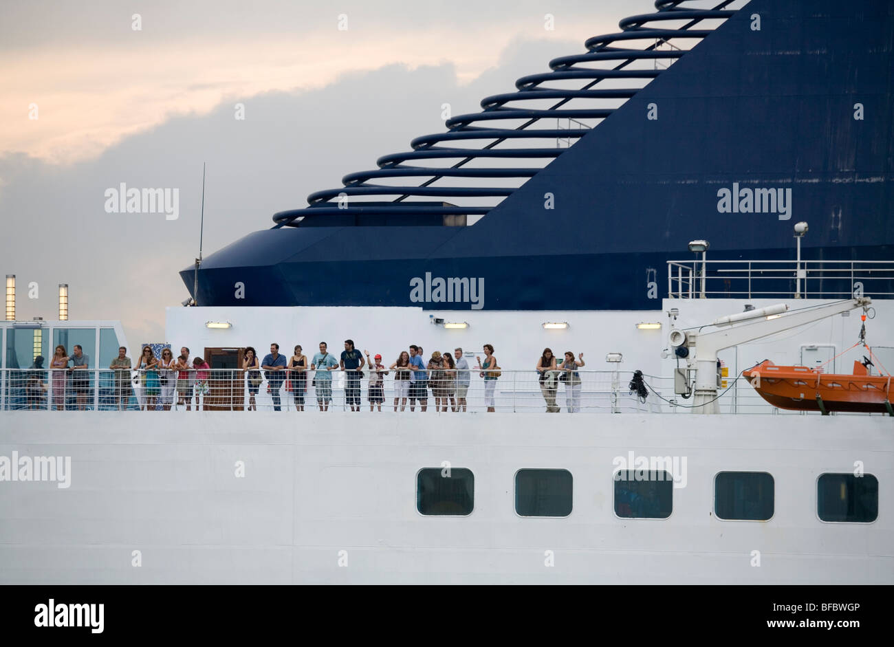 Passengers on the top deck of a cruise ship Stock Photo - Alamy