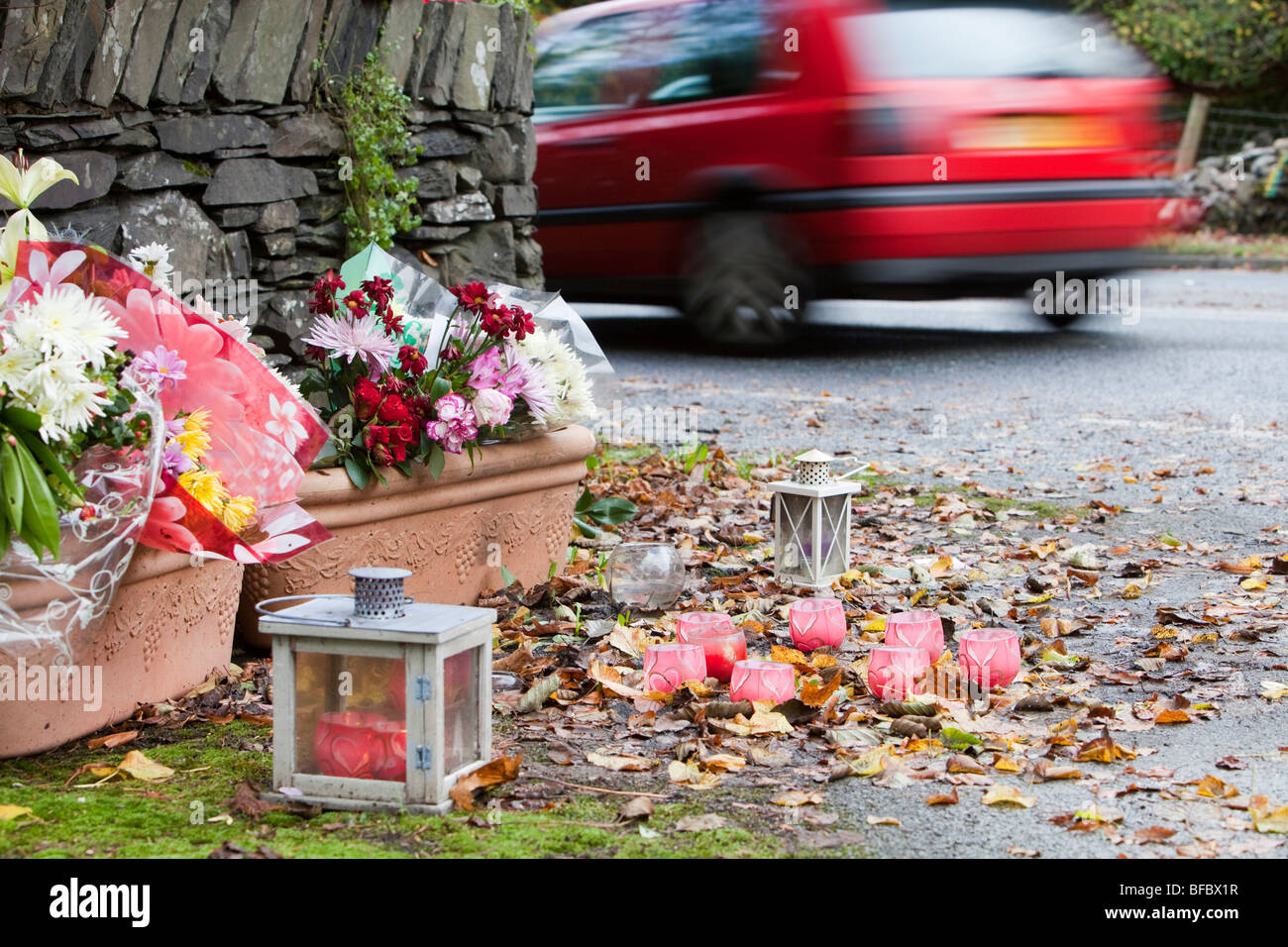 Memorial flowers left at the site of a fatal road traffic accident near
