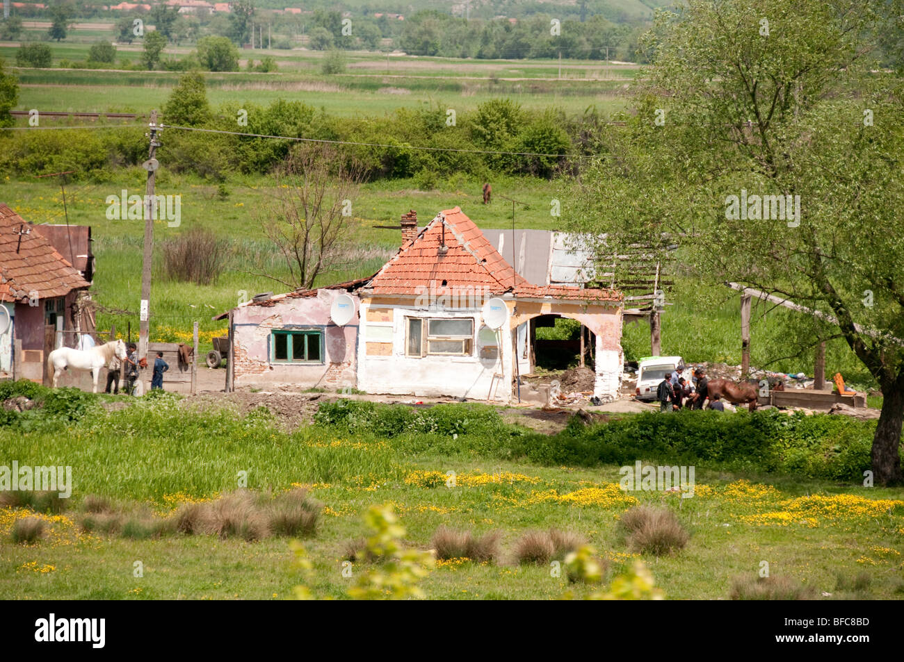 Traditional Roma gypsy farm house in poor condition near Petrila Romania Eastern Europe Stock Photo