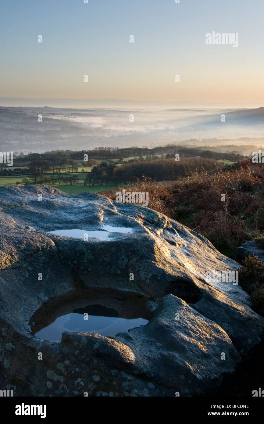 Sunrise, and mist fills the valley of Wharfedale. A view from Ilkley