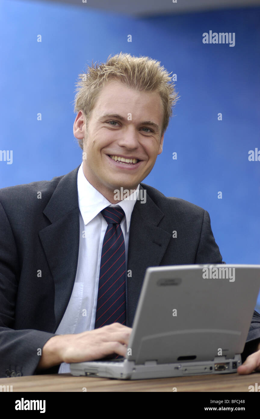 Business man with laptop Stock Photo