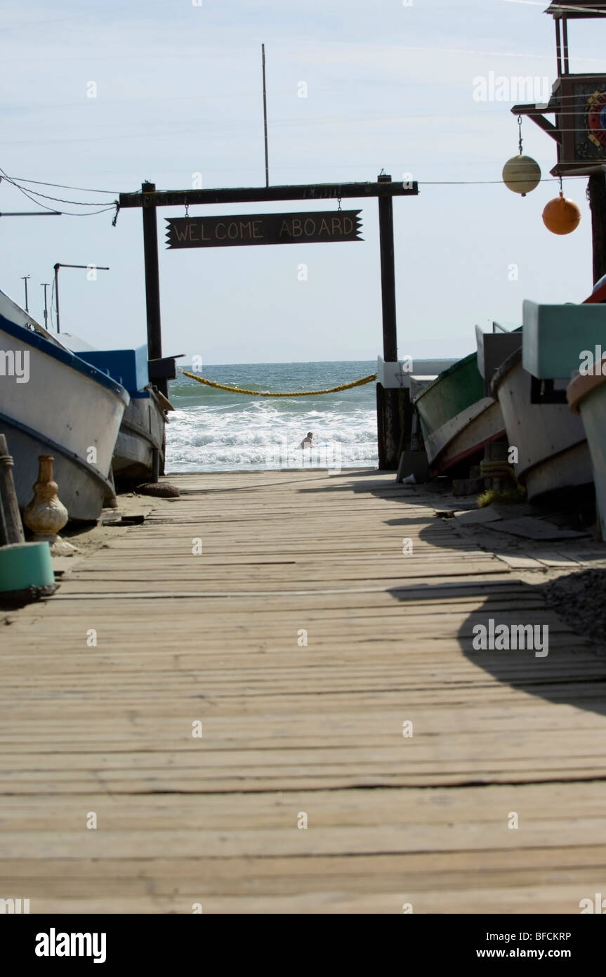 'Newport Beach' pier 'Dory fishing fleet''Welcome aboard' swimmer swimming boats boardwalk Stock Photo