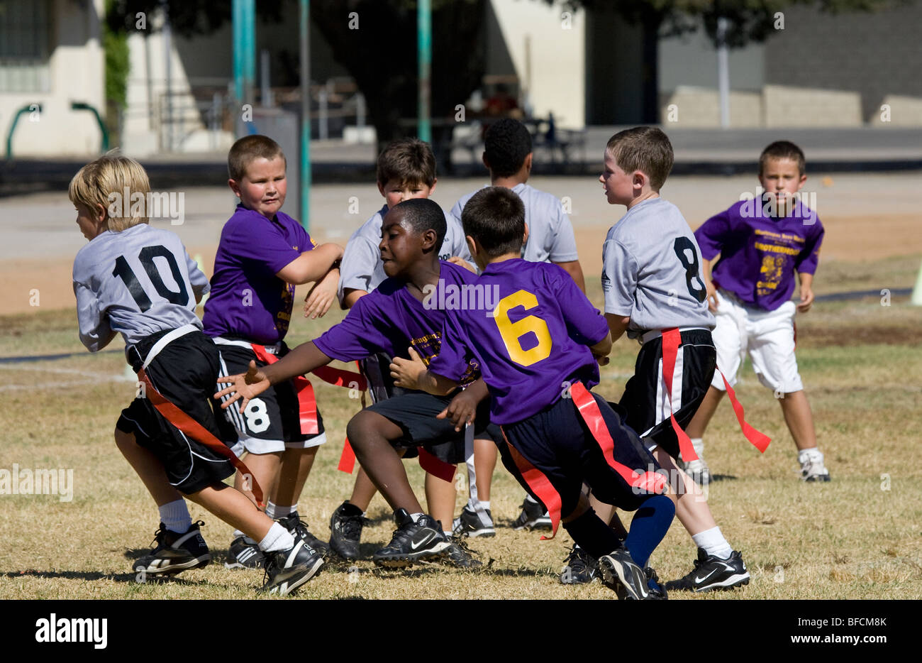 Young boys playing flag football Stock Photo Alamy