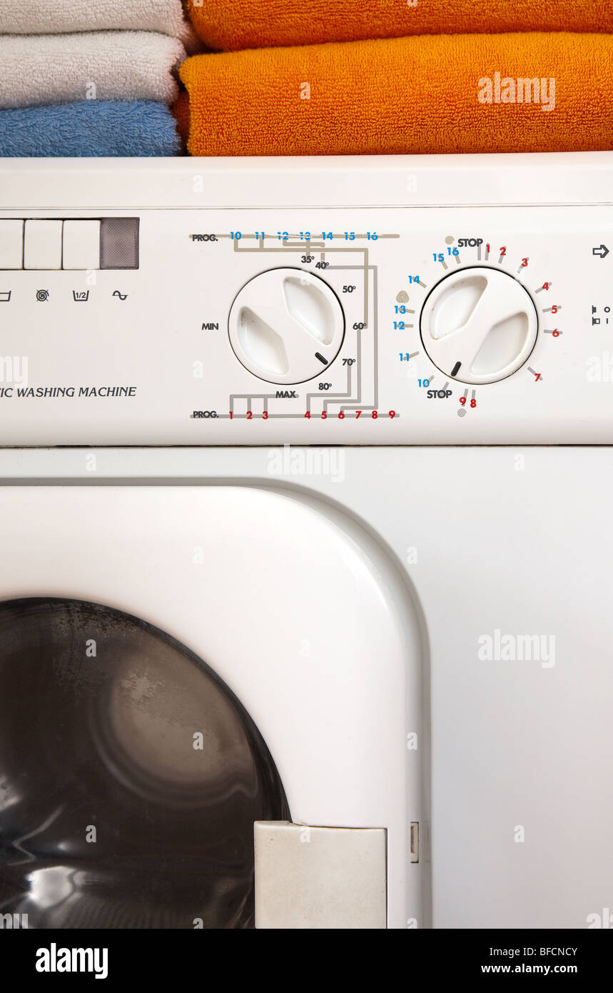 washing machine and towels in bathroom Stock Photo Alamy