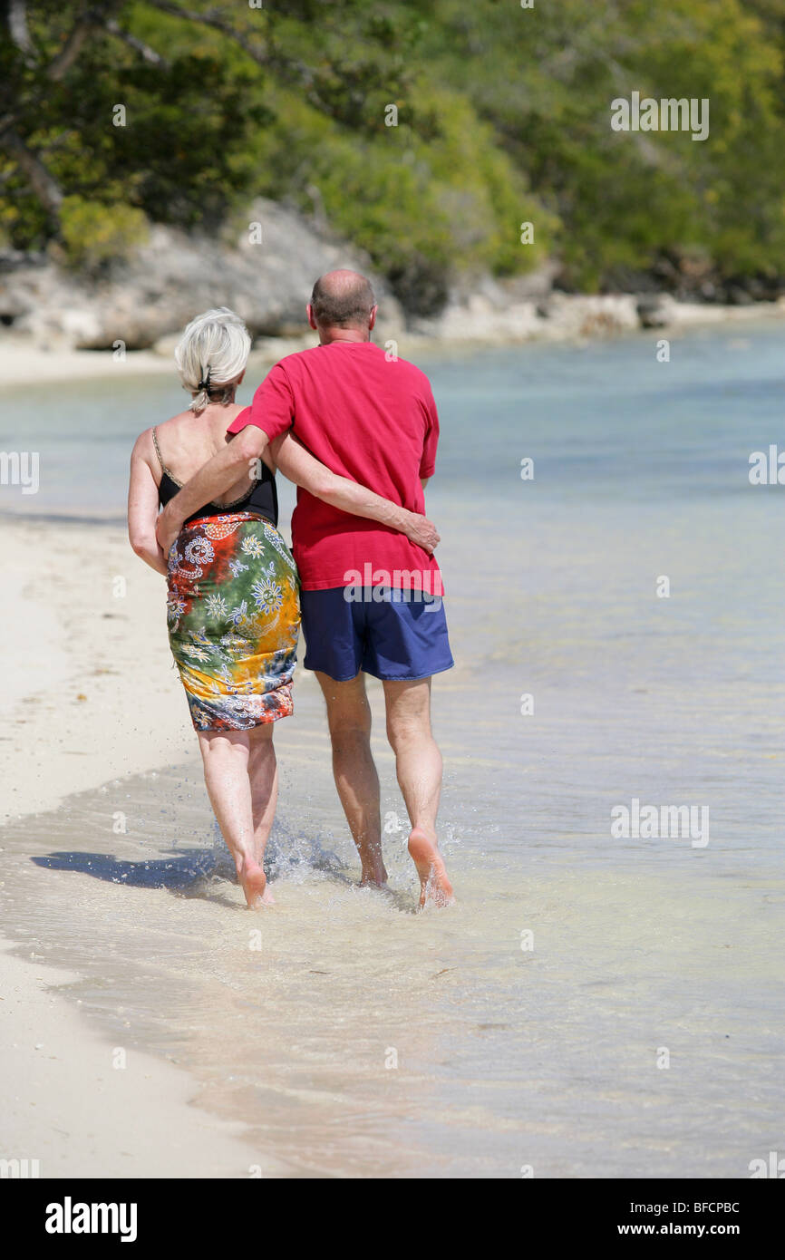 senior couple walking on the beach Stock Photo - Alamy