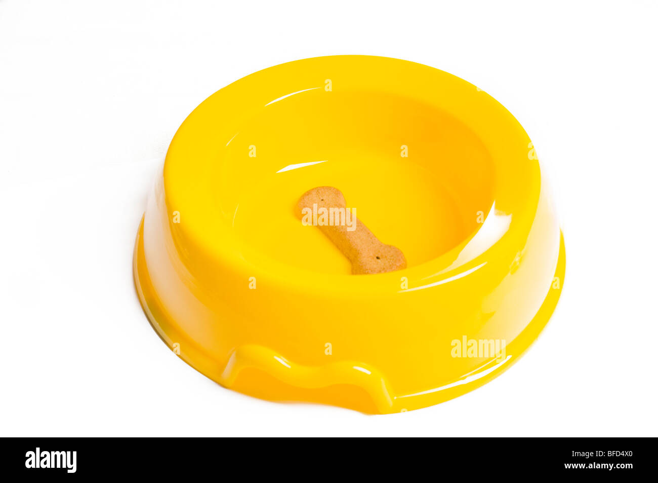 yellow food bowl on a white background Stock Photo